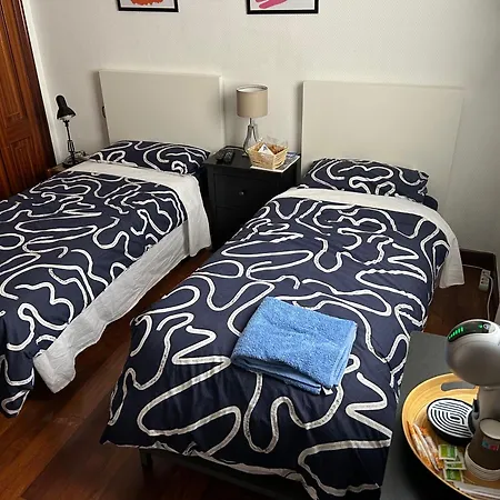 Quarto em Acomodações Particulares Habitacion Alhondiga Casa De Jorge *
